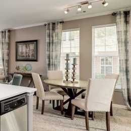 a dining room table and chairs